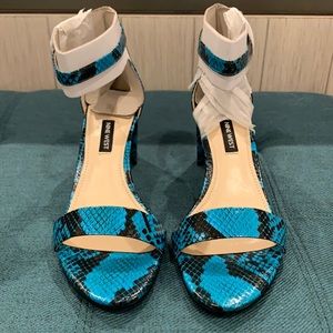 Nine West never worn. Color hard to find!